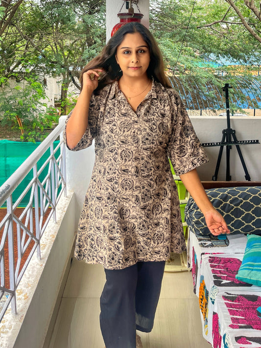 Kalamkari cotton coord set for women with black pants
2. Oversized top with adjustable tie and cotton pants
3. All-day comfortable coord set in Kalamkari print
4. Bohemian cotton outfit for modern women
5. Model wearing Kalamkari cotton coord set size M